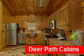 Kitchen with granite counters in 2 bedroom cabin
