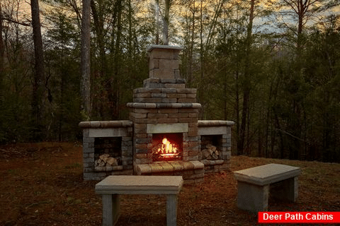 Stone Firepit at 1 Bedroom Honeymoon Cabin - Knotty and Nice
