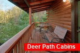 2 bedroom cabin with Rockers on covered deck