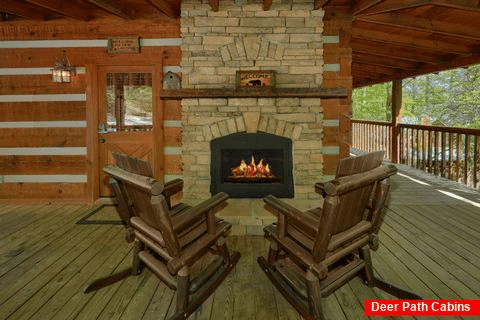 Rustic Cabin with outdoor fireplace and rockers - Kicked Back Creekside