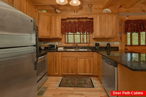 Full kitchen in spacious 1 bedroom cabin - Kicked Back Creekside