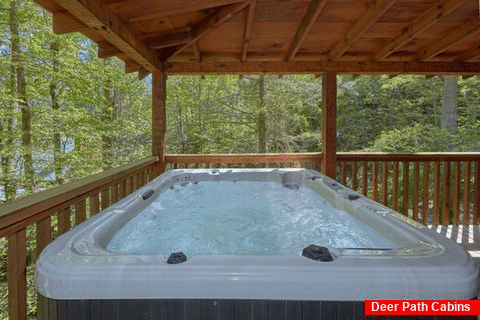 Cabin with private hot tub and fireplace on deck - Kicked Back Creekside