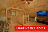 Cabin with Loft bedroom with 2 full beds and TV