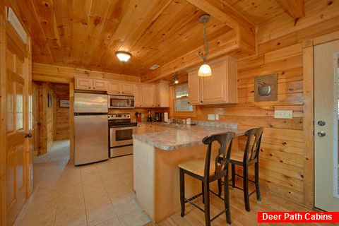 Kitchen in 3 bedrom cabin with bar seating - Bear Mountain Lodge