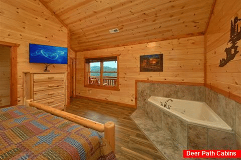 Master Bedroom with King Bed, Jacuzzi, and TV - Majestic Splash