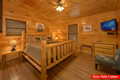 Master bedroom with King bed and private bath - Bear Cove Lodge