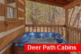 Secluded cabin with private hot tub on deck