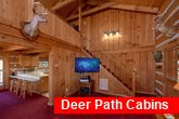 Spacious living room with TV in 2 bedroom cabin