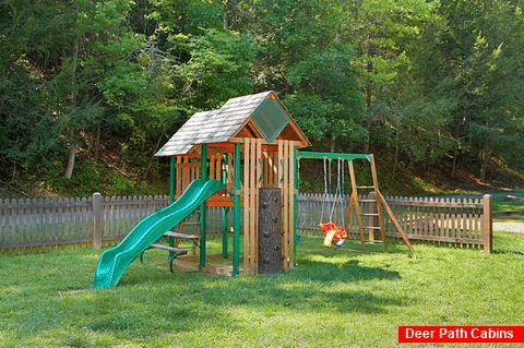 Resort playground and pool with 4 Bedroom cabin - Hillbilly Hideaway