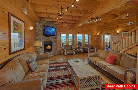 Living room with fireplace in 9 bedroom cabin - Summit View Lodge