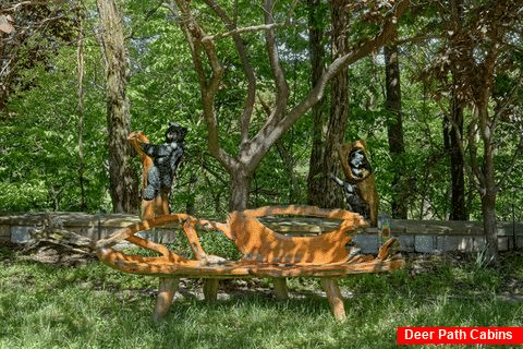 Outside siting area with beautiful carved bench - Majestic Peace