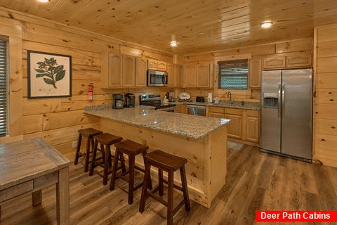 Spacious kitchen and dining area in cabin rental - A Mountain Palace