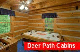 2 bedroom cabin with air hockey game 