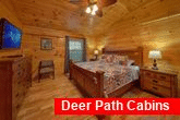 Master bedroom with king bed in 3 bedroom cabin