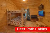 Cabin with Queen bunk beds and 2 gaming TVs