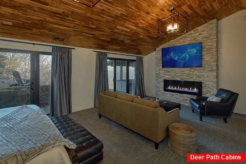 Master bedroom with fireplace in luxury rental - Bluff Mountain Lodge