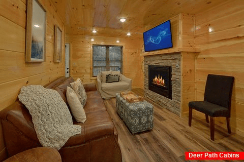 Living room with fireplace in 2 bedroom cabin - Hickory Splash