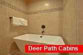 Master Bath with luxurious tub in cabin rental