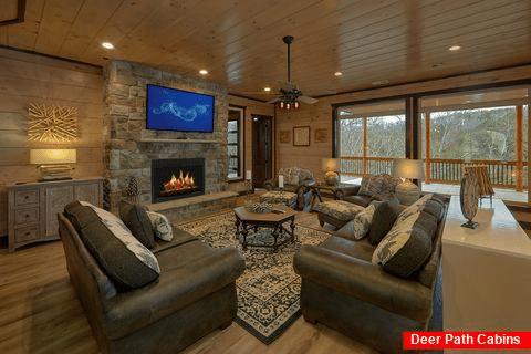 Living Room with Fireplace in 15 bedroom cabin - Smoky Mountain Masterpiece
