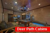 Cabin game room with Arcade games and pool table