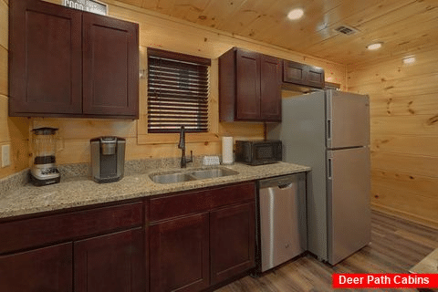 Fully furnished kitchen in 2 bedroom cabin - Laurel Splash