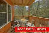 Luxurious 2 bedroom cabin with fire pit on deck