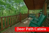 1 bedroom cabin with porch swing and wooded view