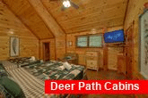 Double King bedroom with TV in 11 bedroom cabin