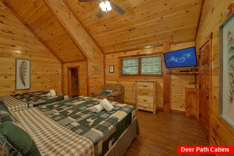 Double King bedroom with TV in 11 bedroom cabin - The Big Lebowski