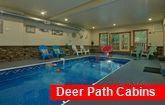 Private indoor pool in 11 bedroom rental cabin
