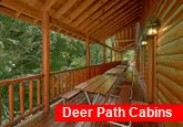 Pigeon Forge cabin with picnic tables on deck