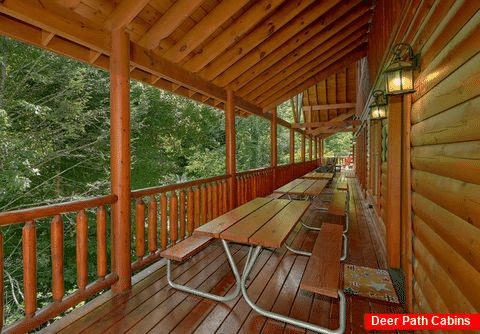 Pigeon Forge cabin with picnic tables on deck - The Big Lebowski