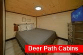 King Bedroom with TV in 6 bedroom rental cabin
