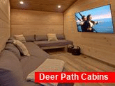 Luxury cabin with loft couch and game room TV