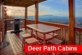 Cabin with grill, picnic table and mountain view