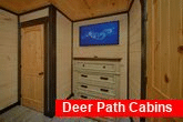 Bunk bedroom with TV in 5 bedroom rental cabin