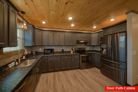 Fully furnished kitchen in 6 bedroom cabin - Ain't Life Grand
