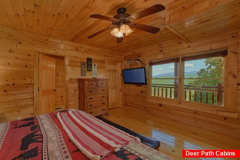 Luxury Cabin Master Bedroom with a Mountain View - Endless Sunrises