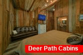Luxurious cabin bedroom with barn wood walls