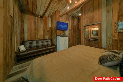 Luxurious cabin bedroom with barn wood walls - A View From Above