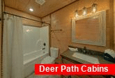 Bunk bedroom and full bathroom in cabin rental