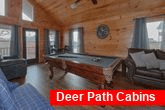 2 bedroom cabin game room with arcade game