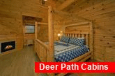 Luxurious cabin master Bedroom with fireplace