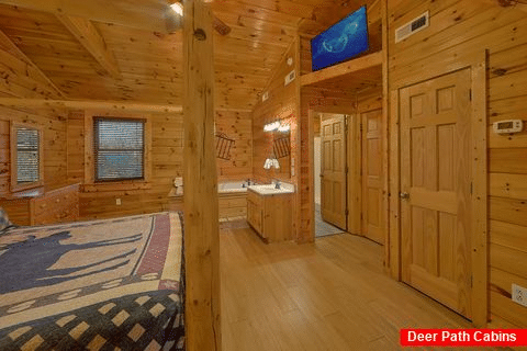 Master Bedroom with Jacuzzi in 4 bedroom cabin - A Smoky Mountain Experience