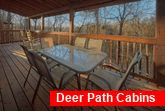 4 bedroom cabin with covered deck and grill
