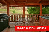 2 bedroom cabin with covered porch and gas grill