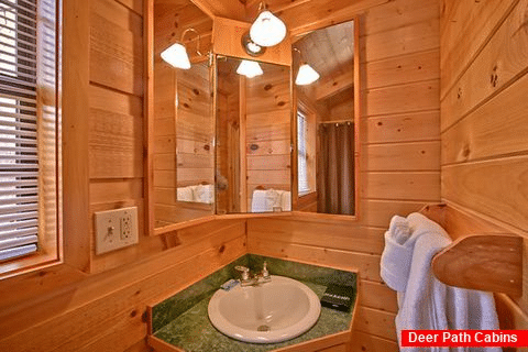 Cabin with lighted bath mirror - Where the Magic Happens