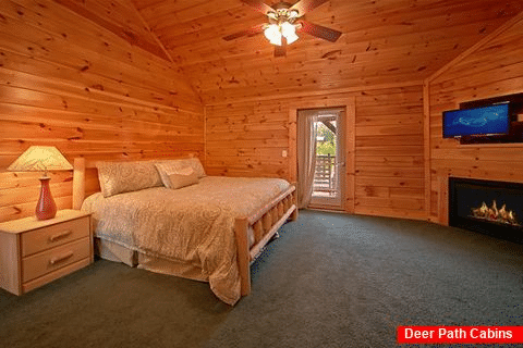 Cabin with a fireplace in master suite - Timber Lodge